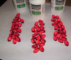 DXM Robitussin pills displyed as unusual household high called "robotripping"