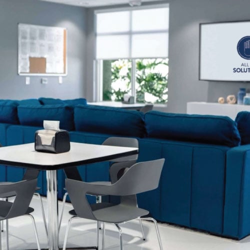couch and table in common area of detox rehab near west palm beach