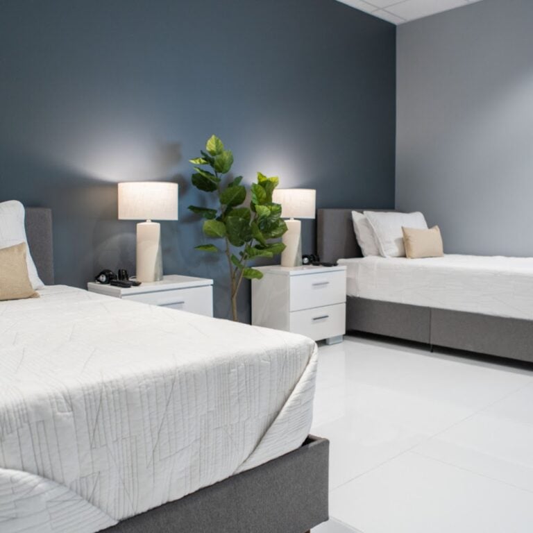 two patient beds in clean modern bedroom in rehab center in west palm beach, florida
