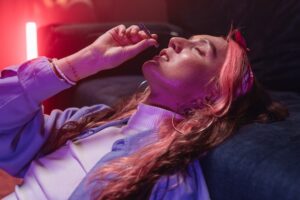 Woman smoking marijuana.