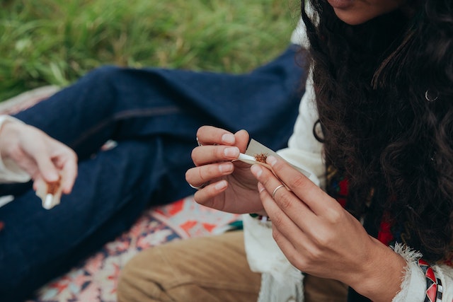 Person rolling a cigarette