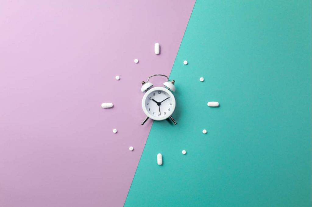 clock with pills around it